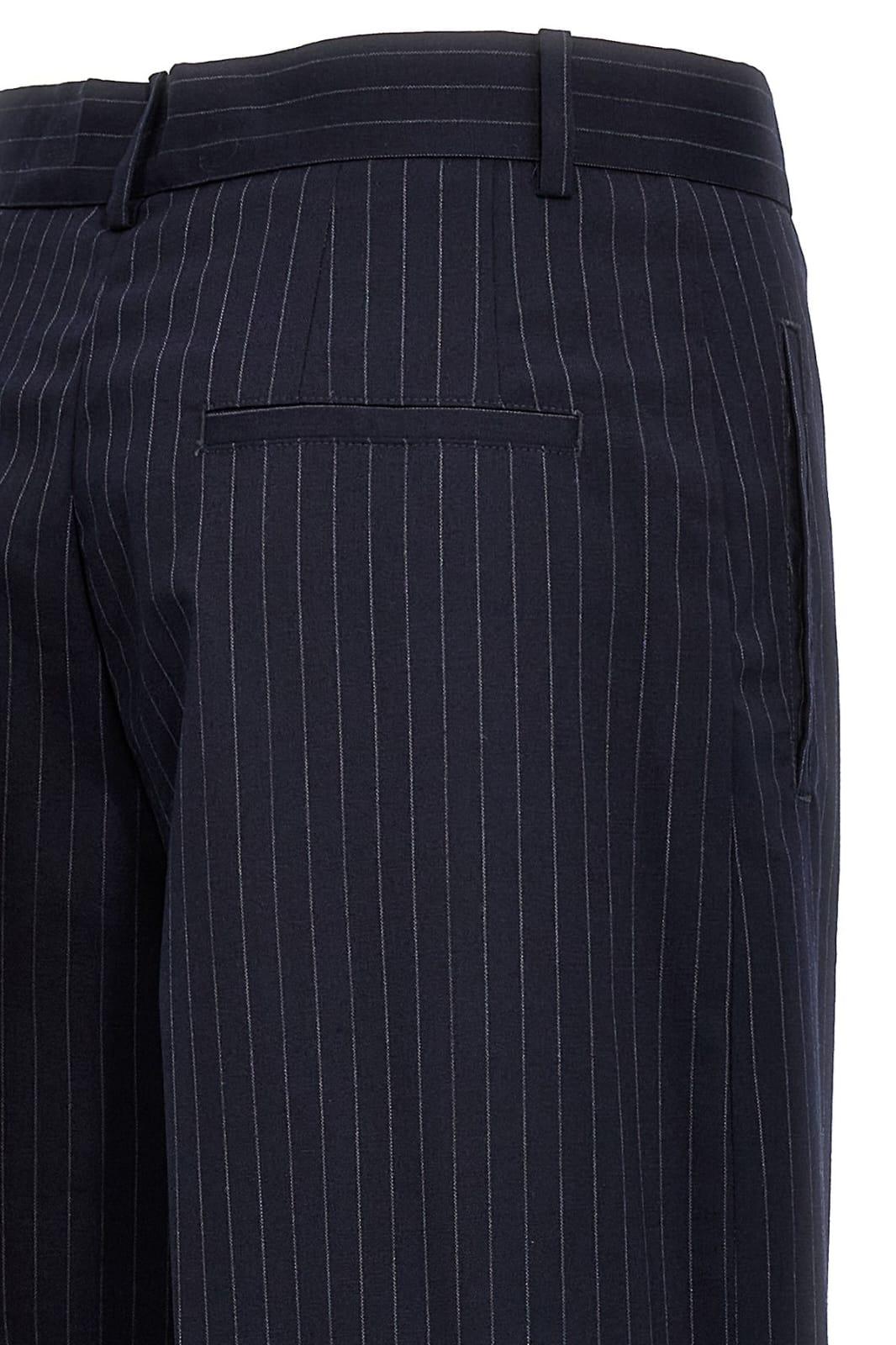 PANTALONI GESSATI A GAMBA AMPIA