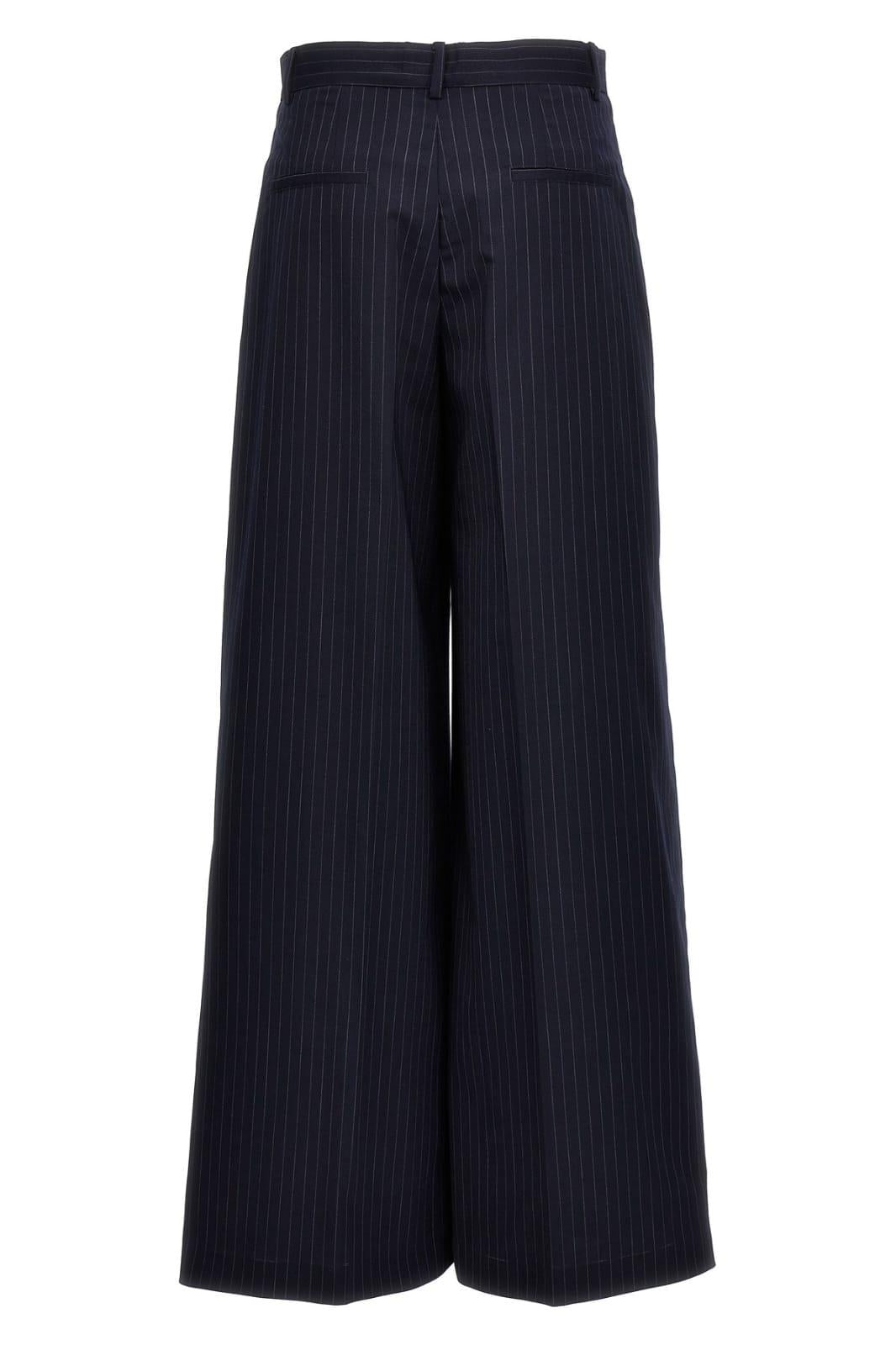 PANTALONI GESSATI A GAMBA AMPIA